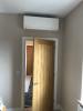 Internal view of air conditioning unit above bedroom door